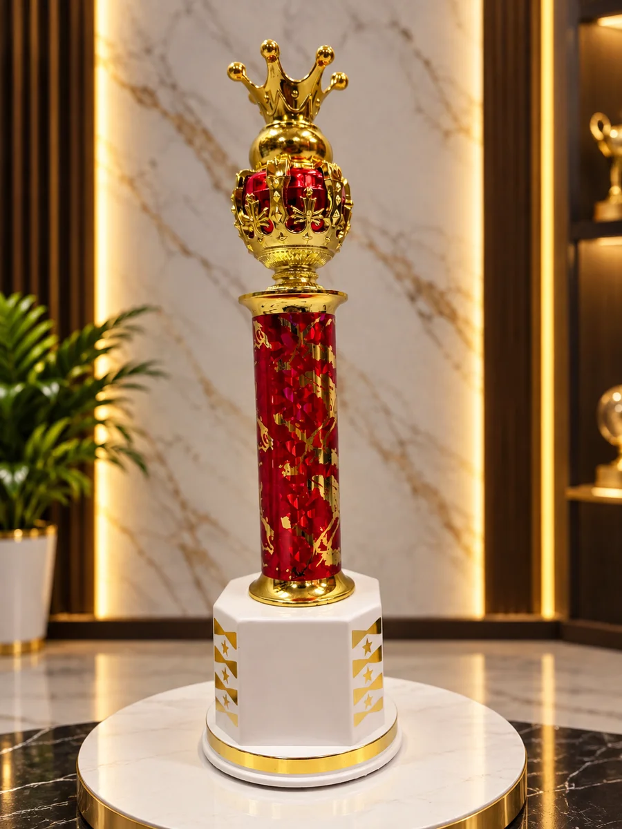 Golden victory trophy with an elegant red and gold column