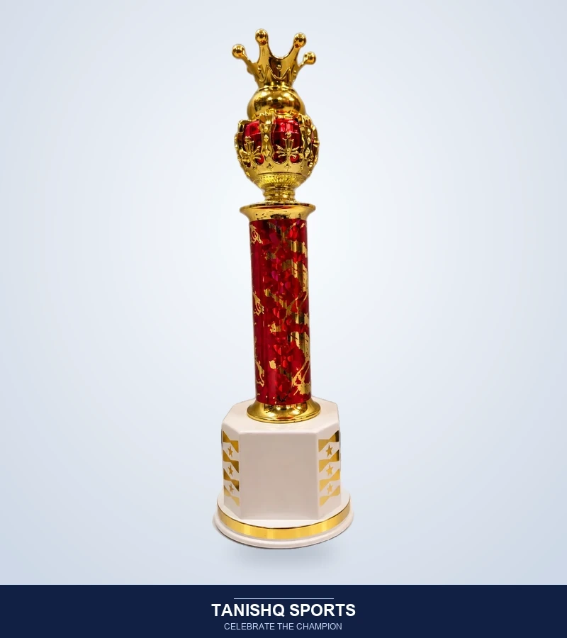 Golden victory trophy with an elegant red and gold column